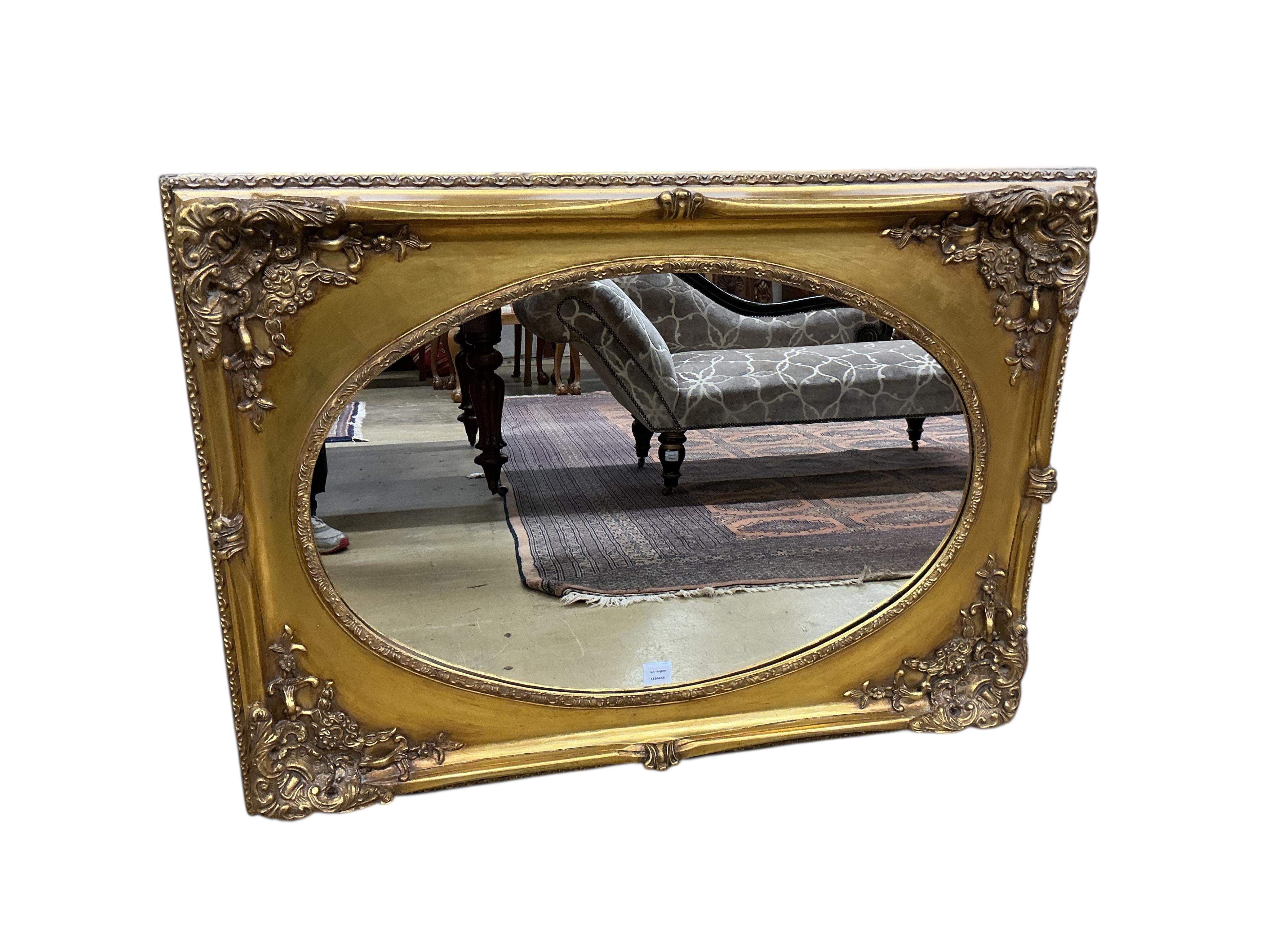 A Victorian style rectangular gilt composition wall mirror, width 114cm, height 84cm